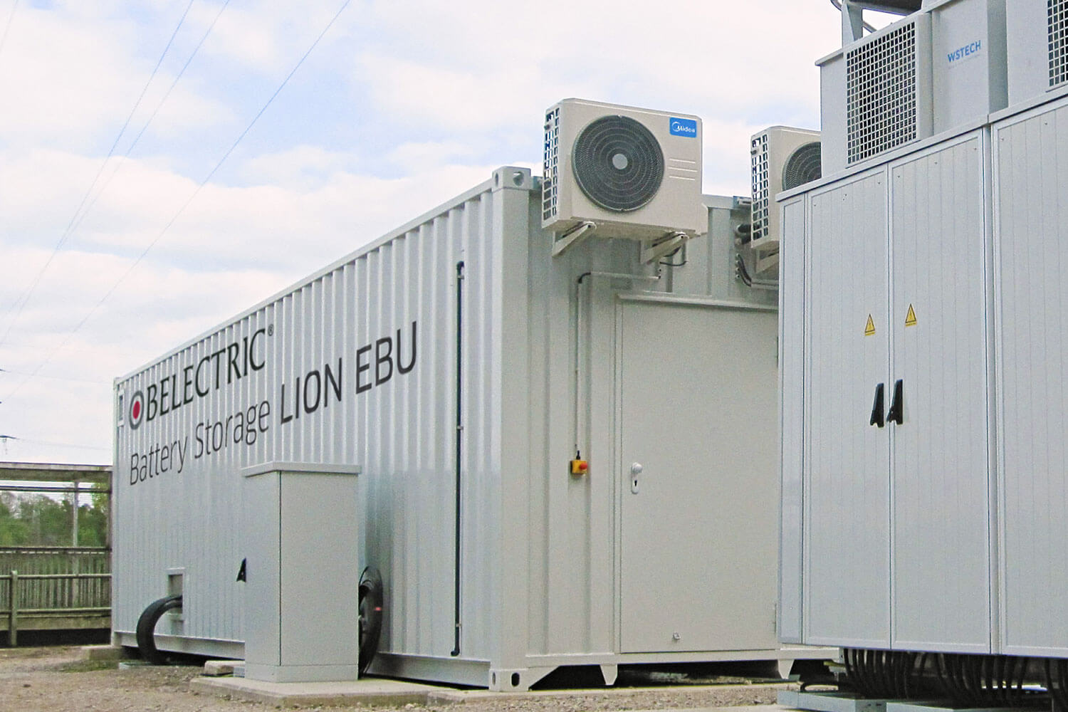 A white container with the text BELECTRIC Battery Storage Lion EBU