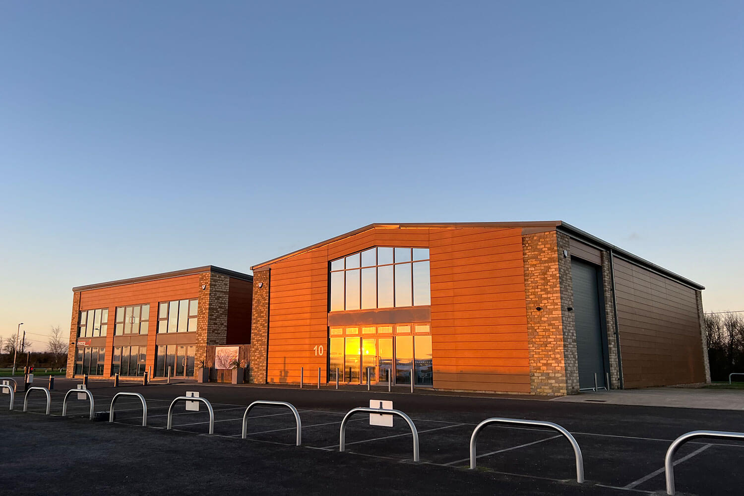 BELECTRIC's office in Brinkworth, UK, seen from the outside at sunset